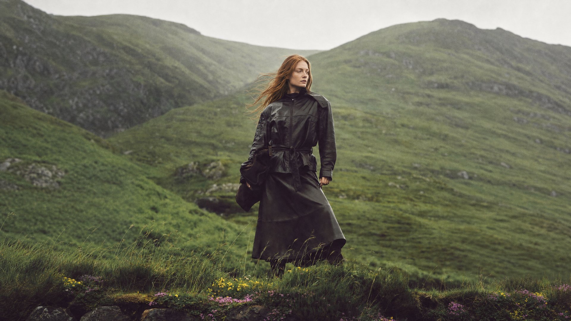 New interpretation with a windswept model in a black coat